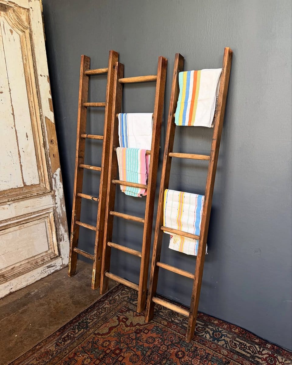antique finish ladder with vintage pots
