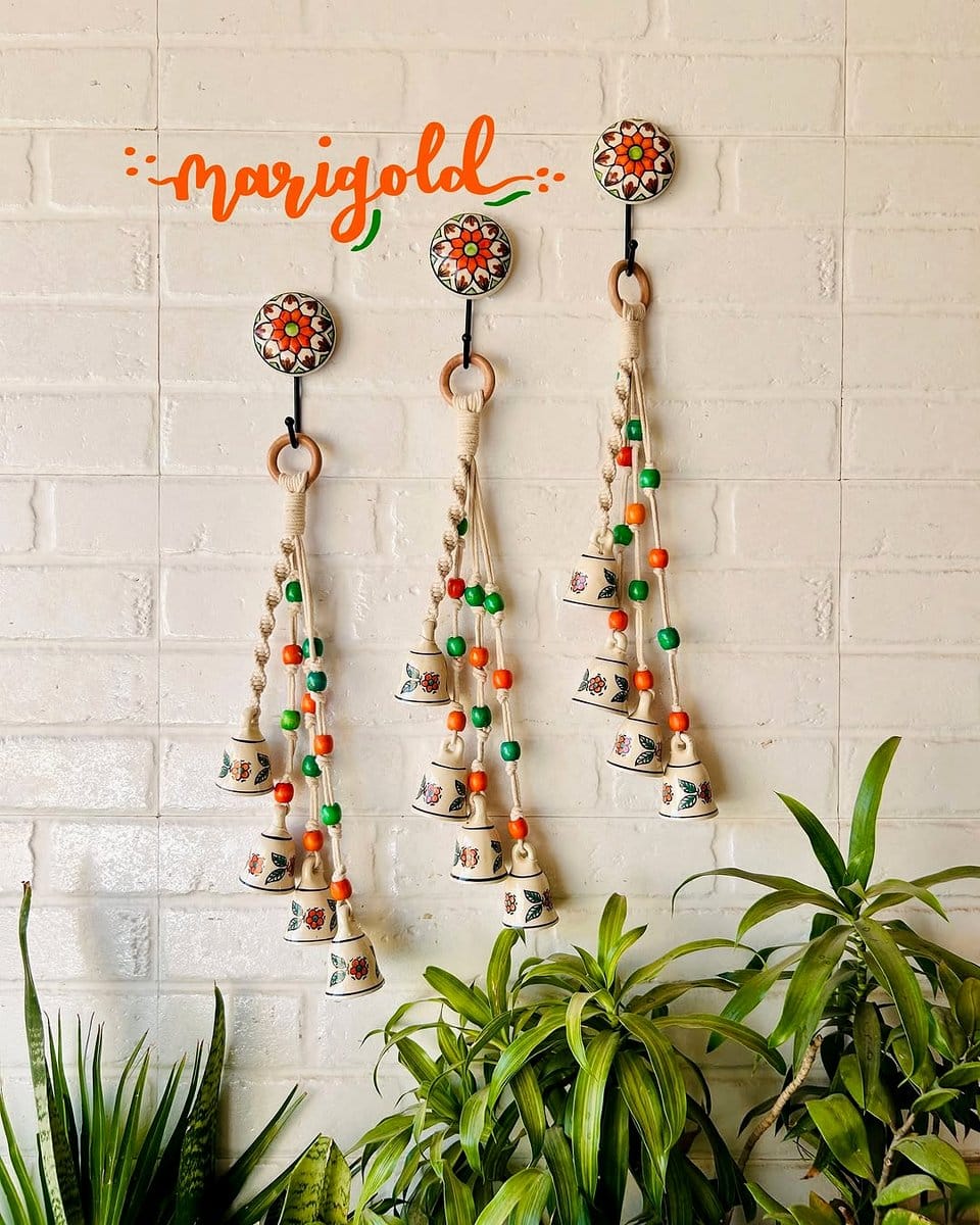 Recycled metal wind chime plant hanger