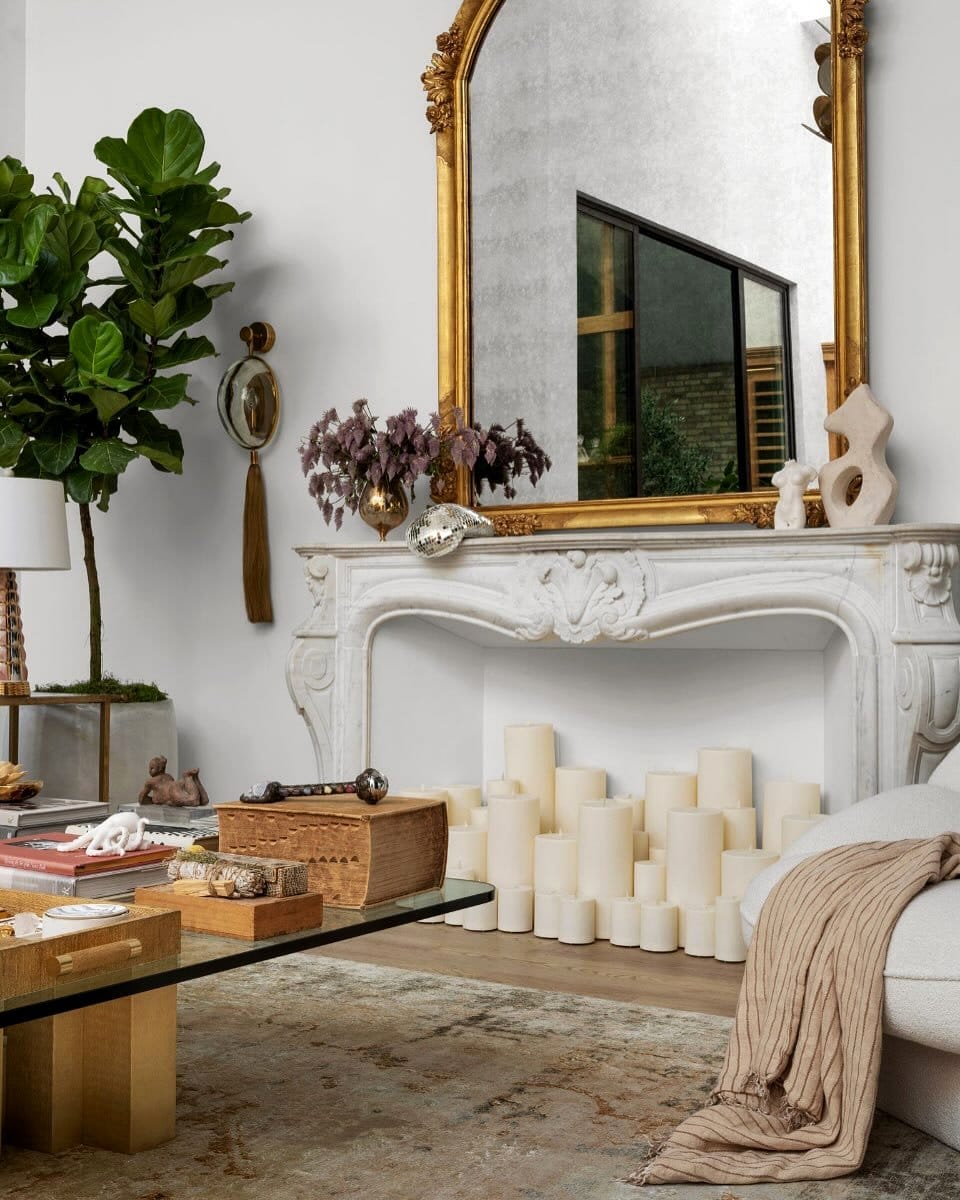 gold candle holders on mantel