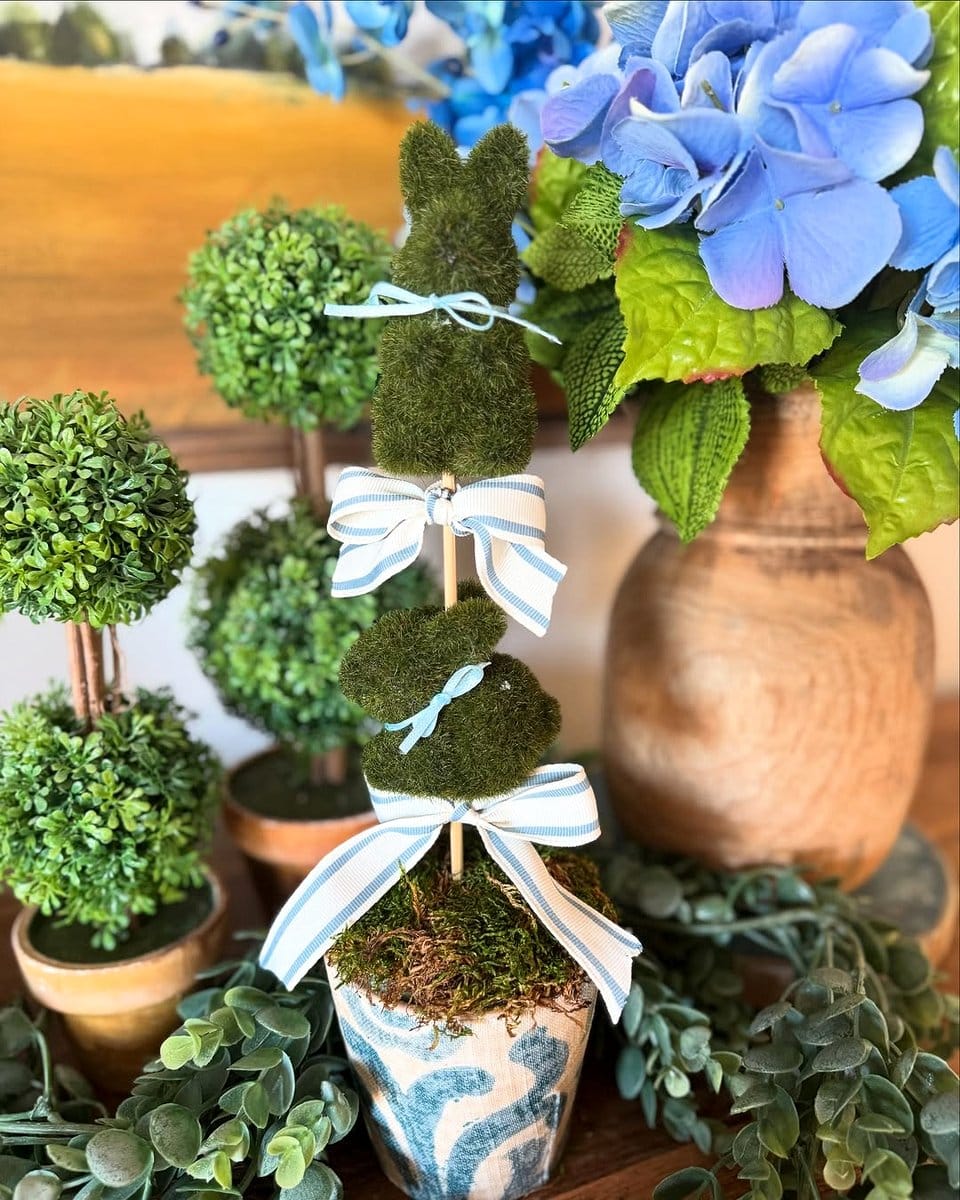 moss-wrapped topiary forms