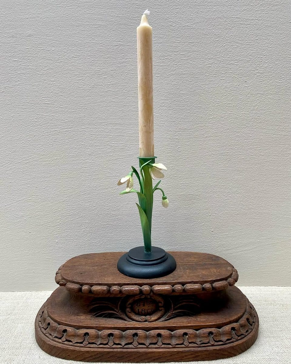 Handmade stone and lichen candle holders