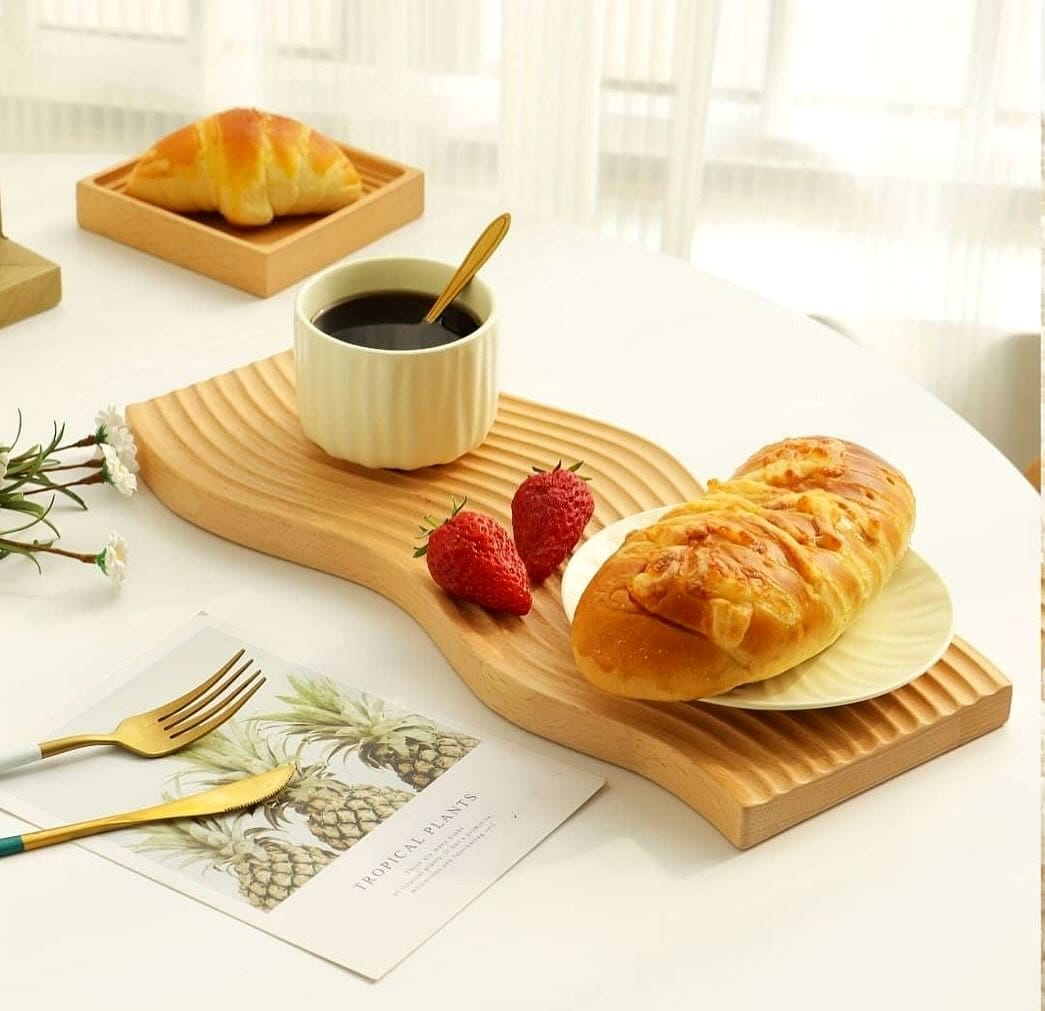 decorative wooden tray with breakfast