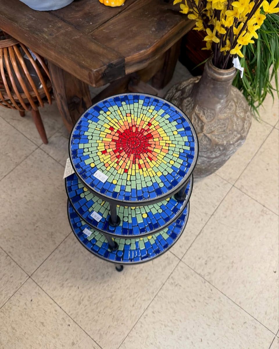 mosaic-tiled cable spool table with plants