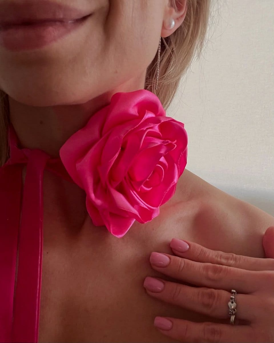 floral choker around neck