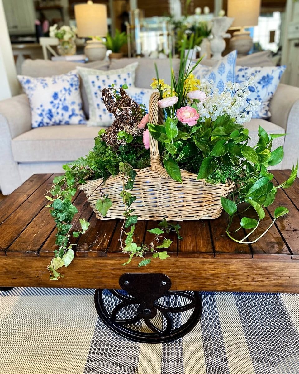 pothos in a hanging basket above a reading nook