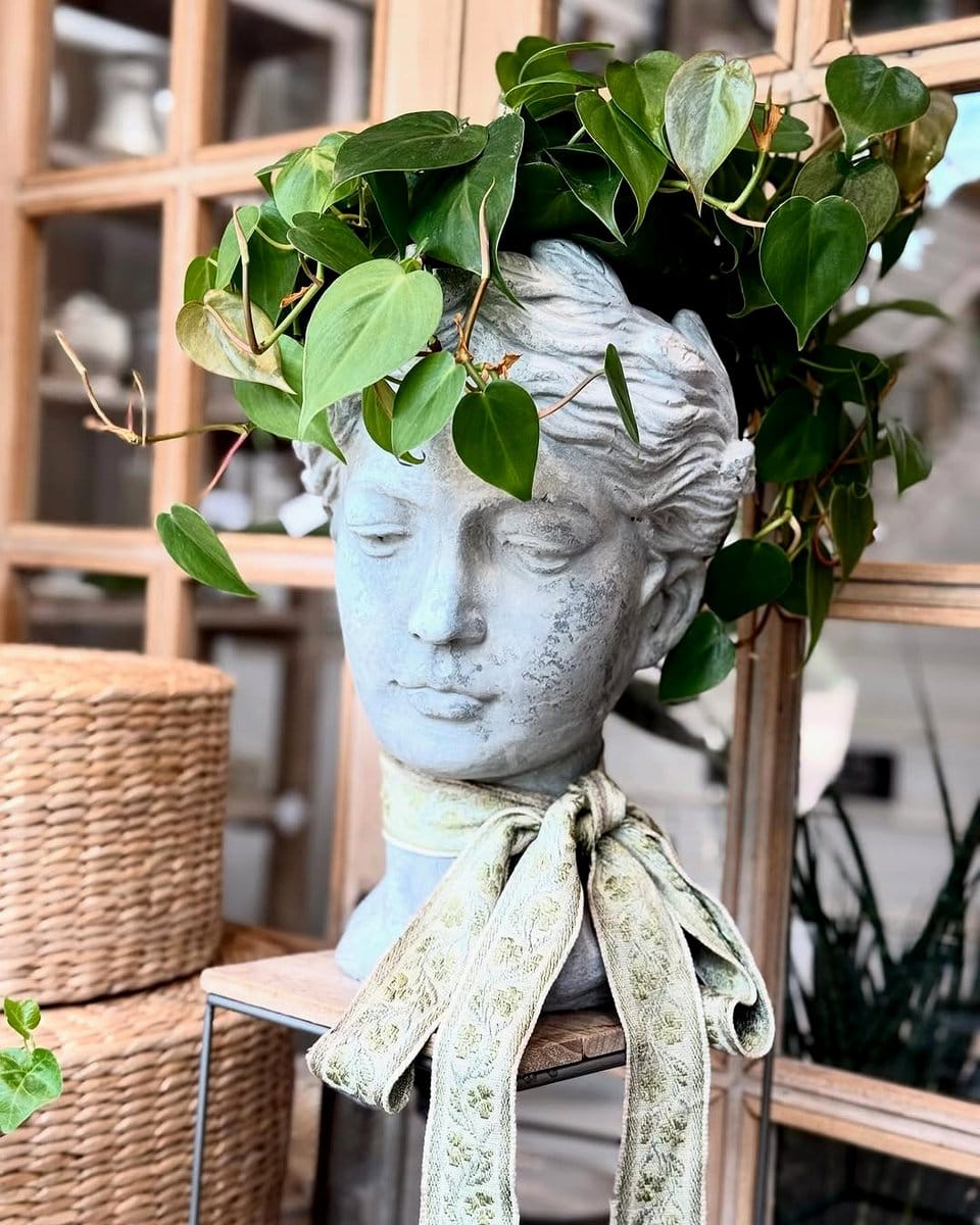 driftwood with wildflowers and greenery