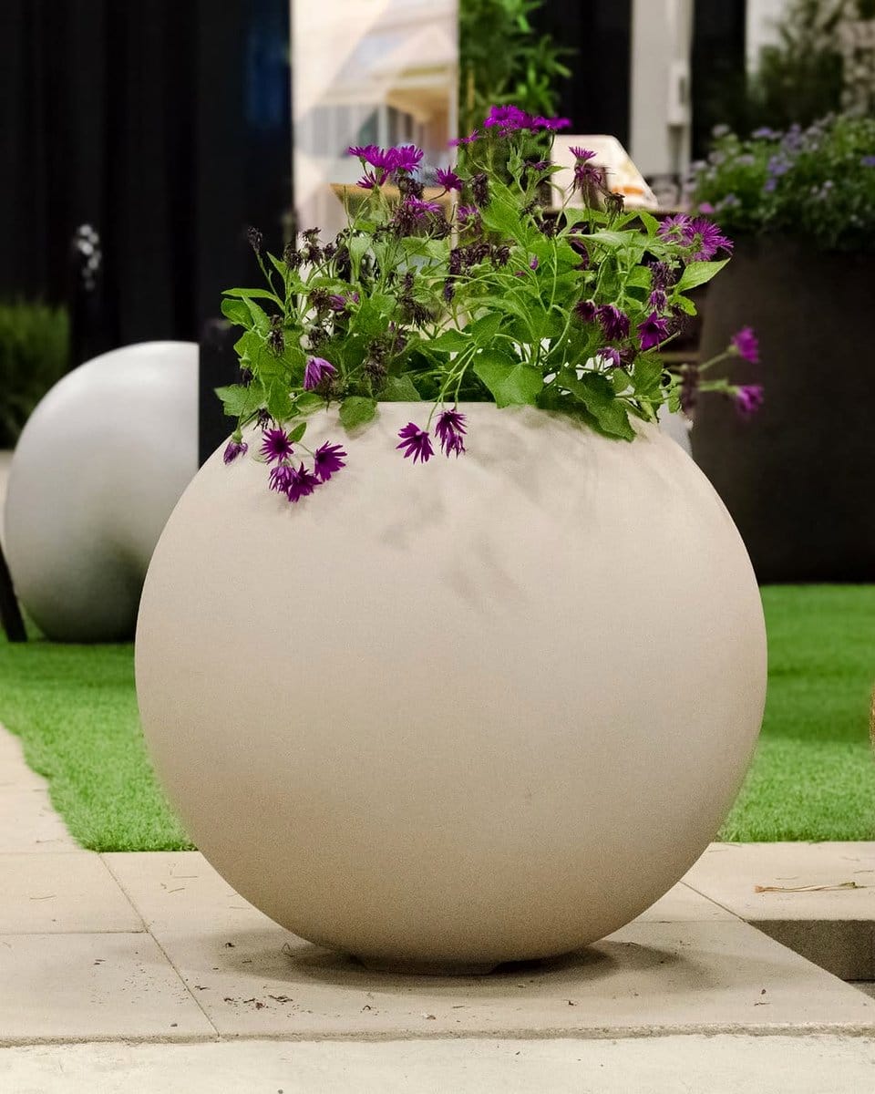 eco-friendly fiberglass planter in backyard