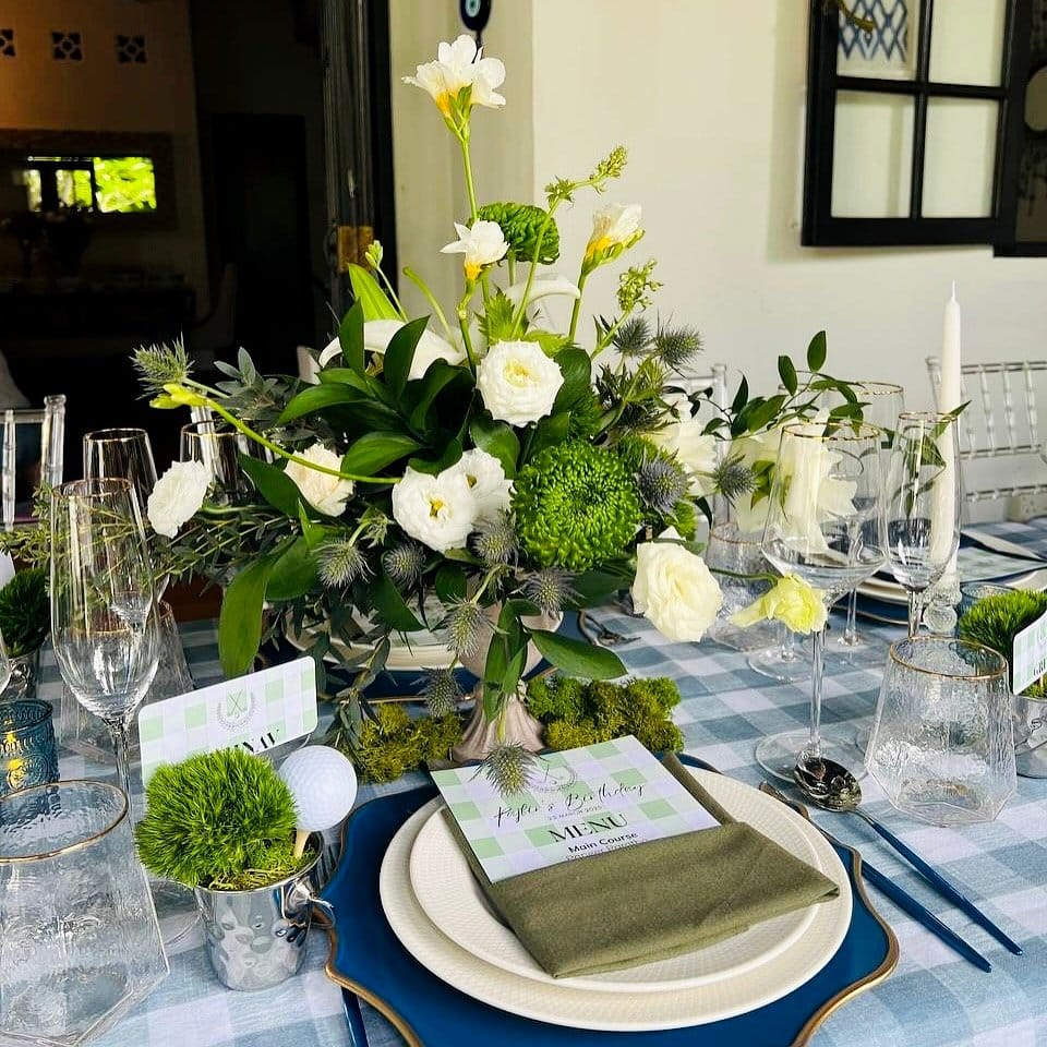 Outdoor garden party with tartan plaid plant accents