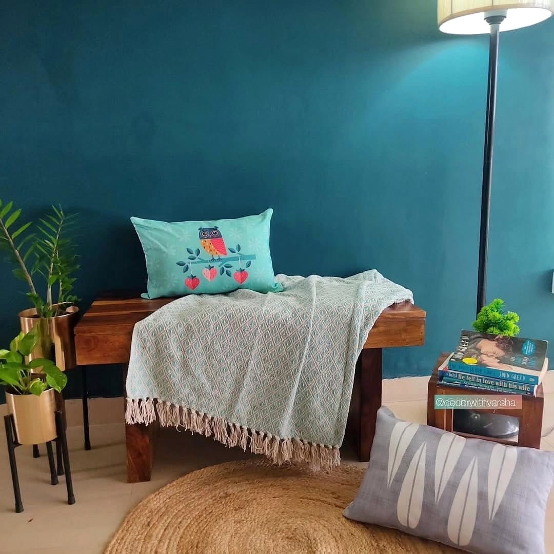 Peaceful meditation space with jade plants and cushions