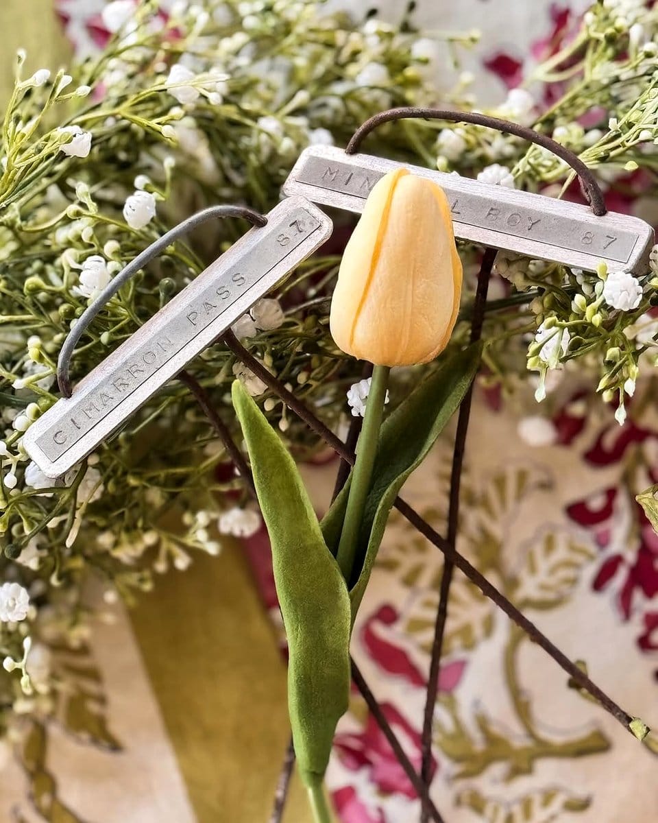 herb-filled tin can centerpieces