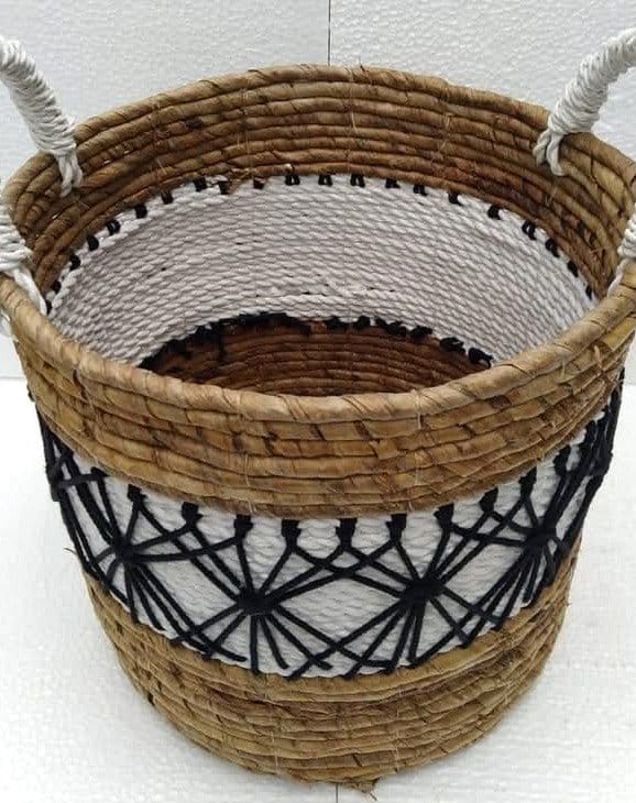 Geometric quilted plant pot cover with bold shapes