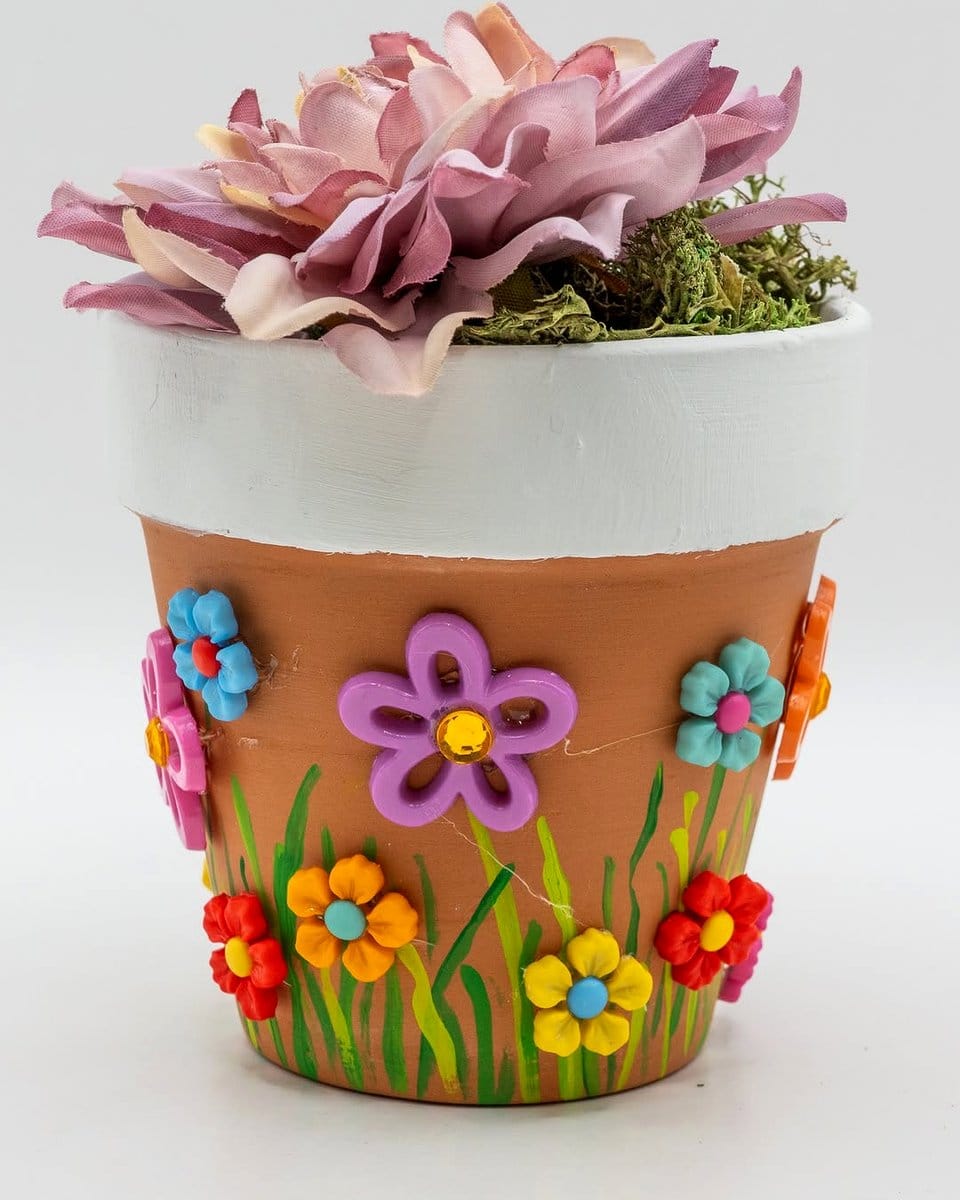 beaded clay pot with tropical plant