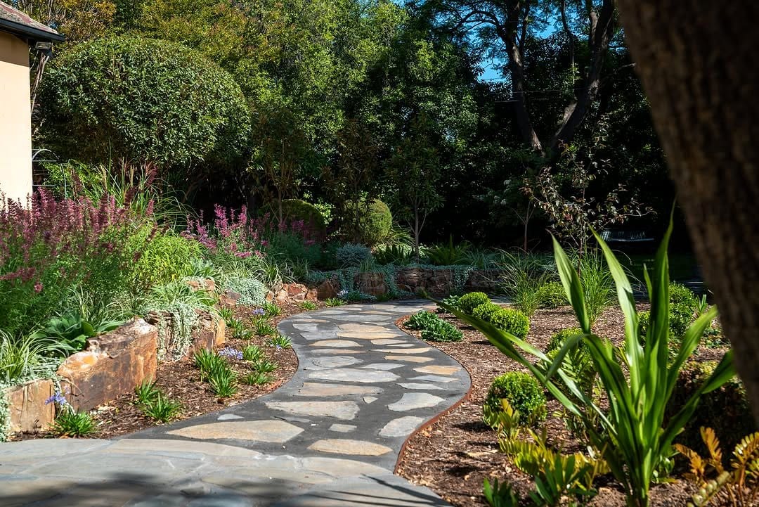 Rustic garden path with Siberian Fur and moss