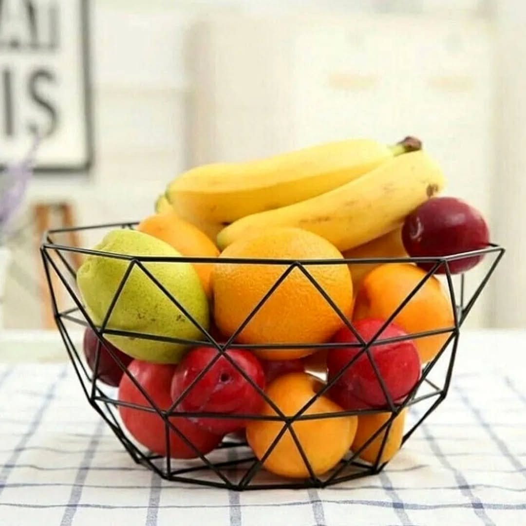 abstract metal basket with fruits