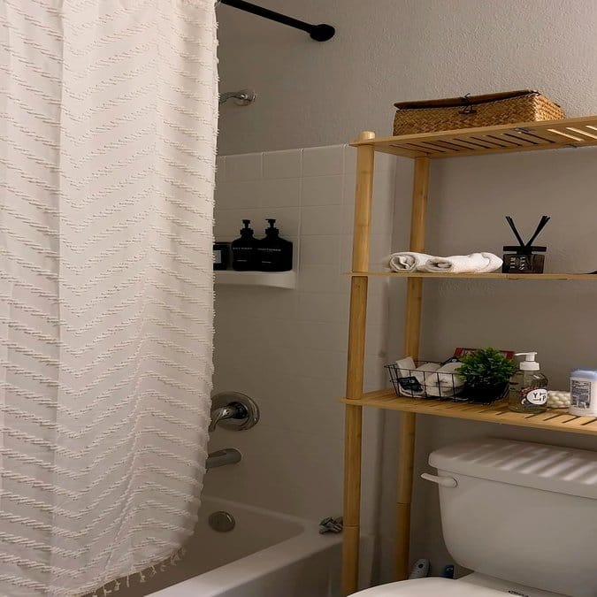 Bamboo bathroom shelf with moisture-loving plants