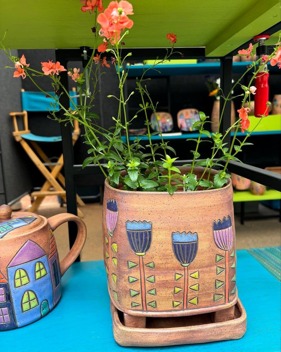 colorful ceramic pots on table