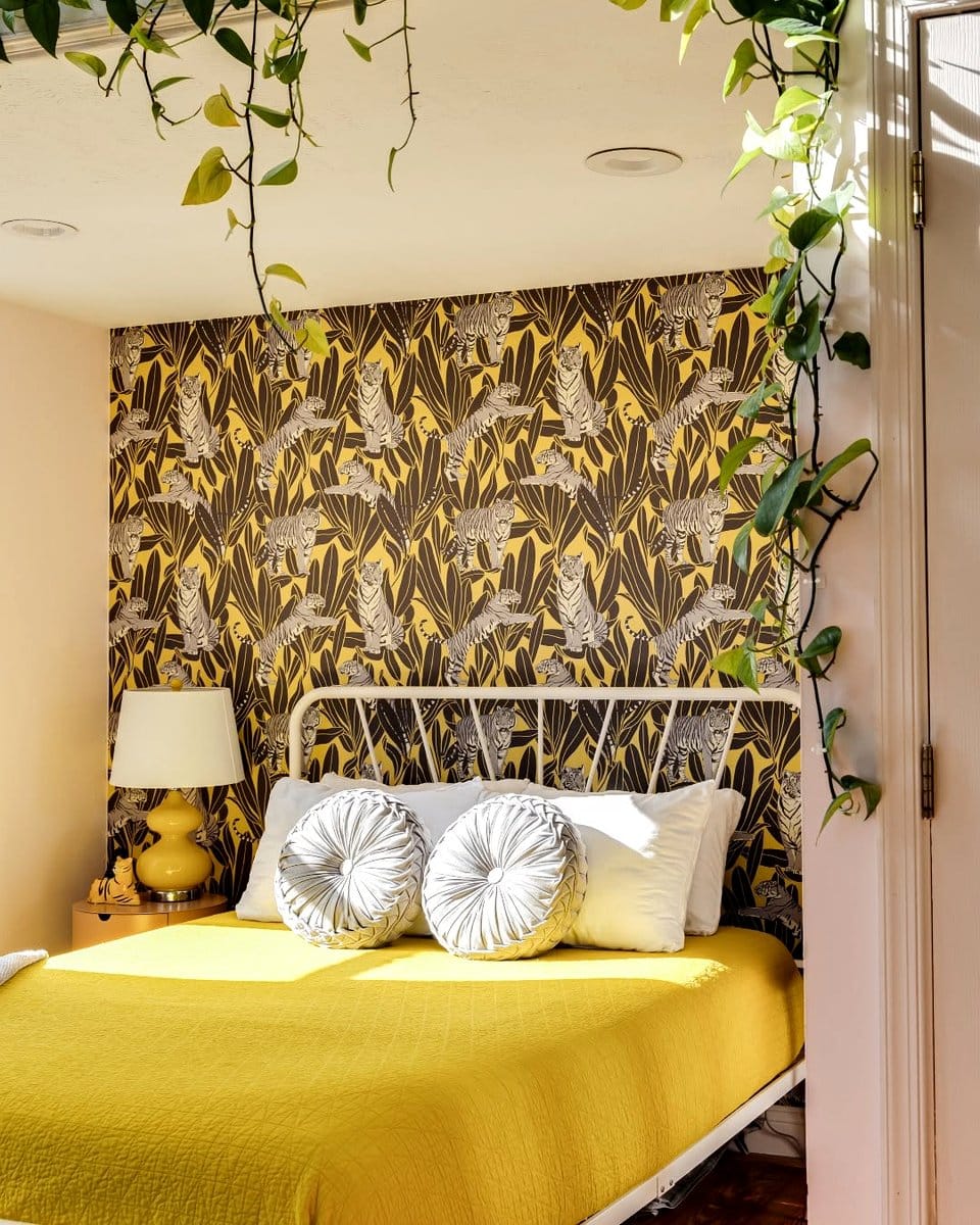 leaf-patterned cushions on chair