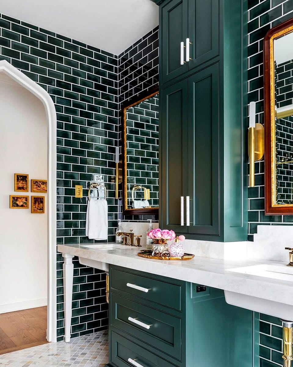 forest green accent wall behind sink