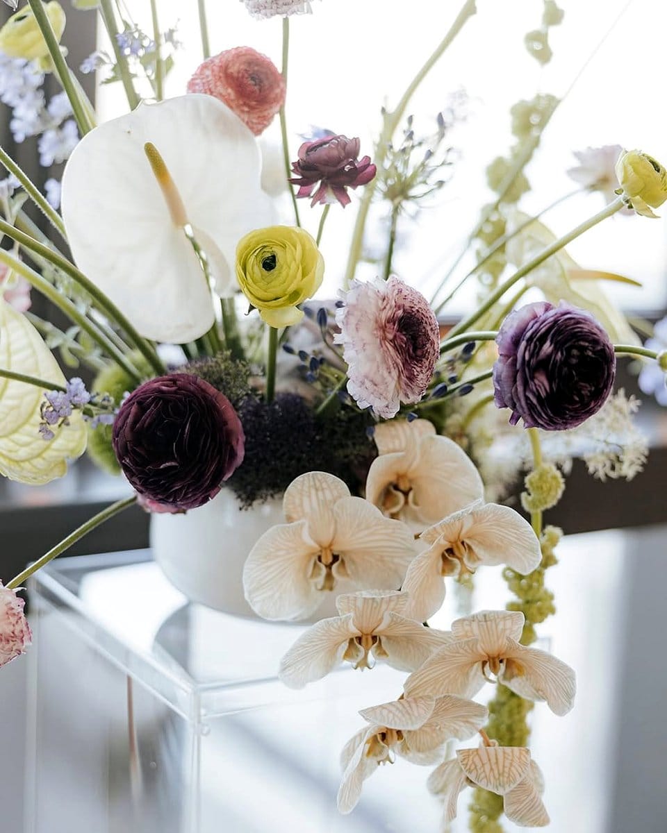 DIY gear and pipe plant holder with orchids
