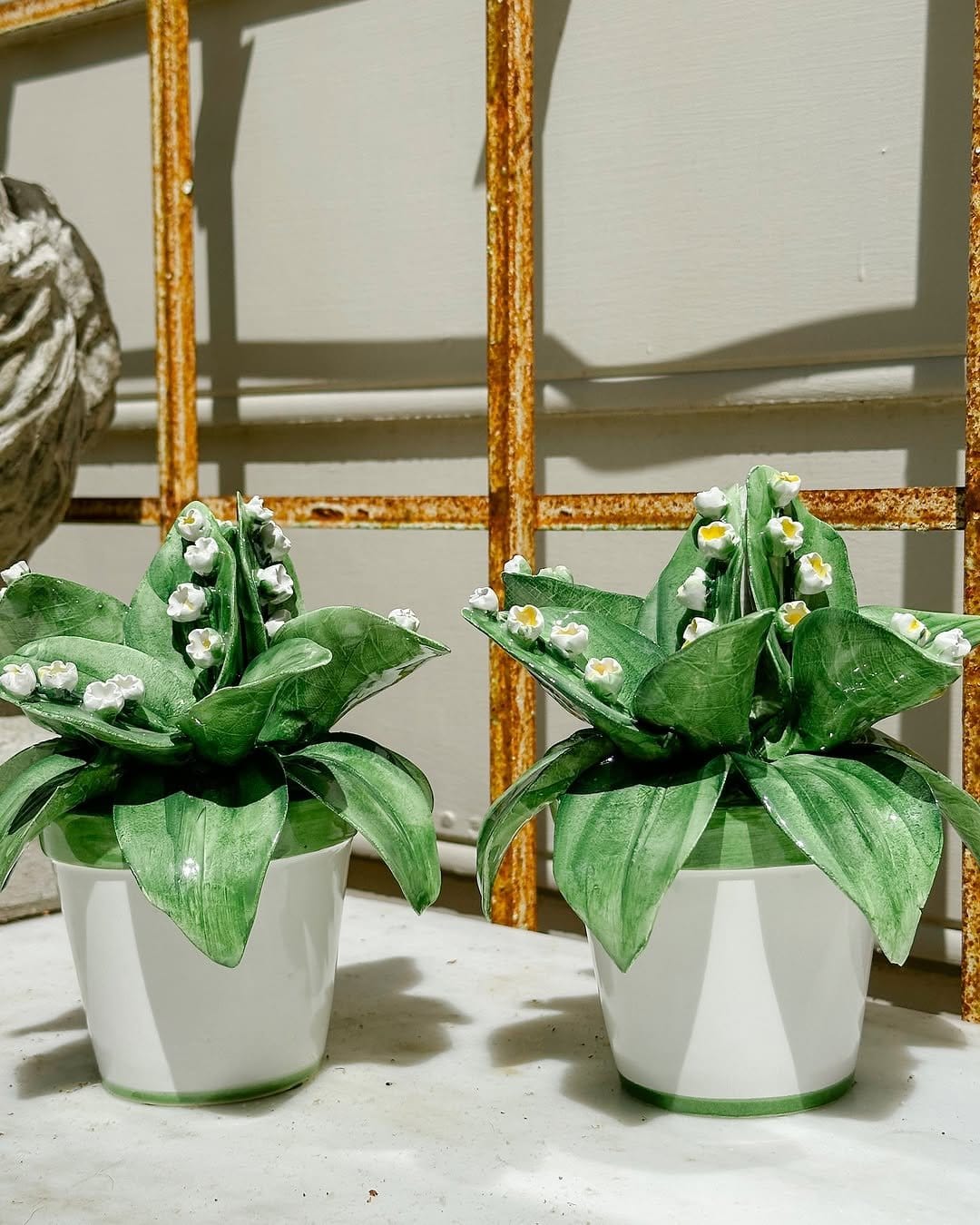 Botanical prints paired with potted herbs