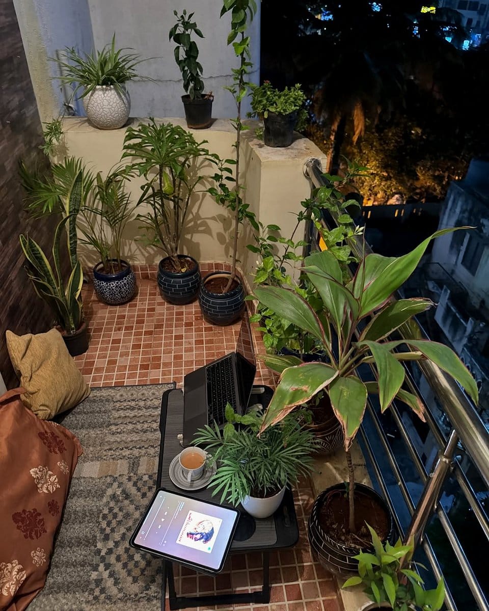 Dining table with small neon cactus arrangements