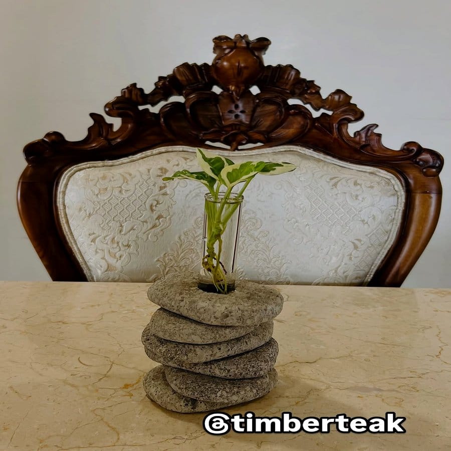 Rustic wooden shelf with raindrop glass planters