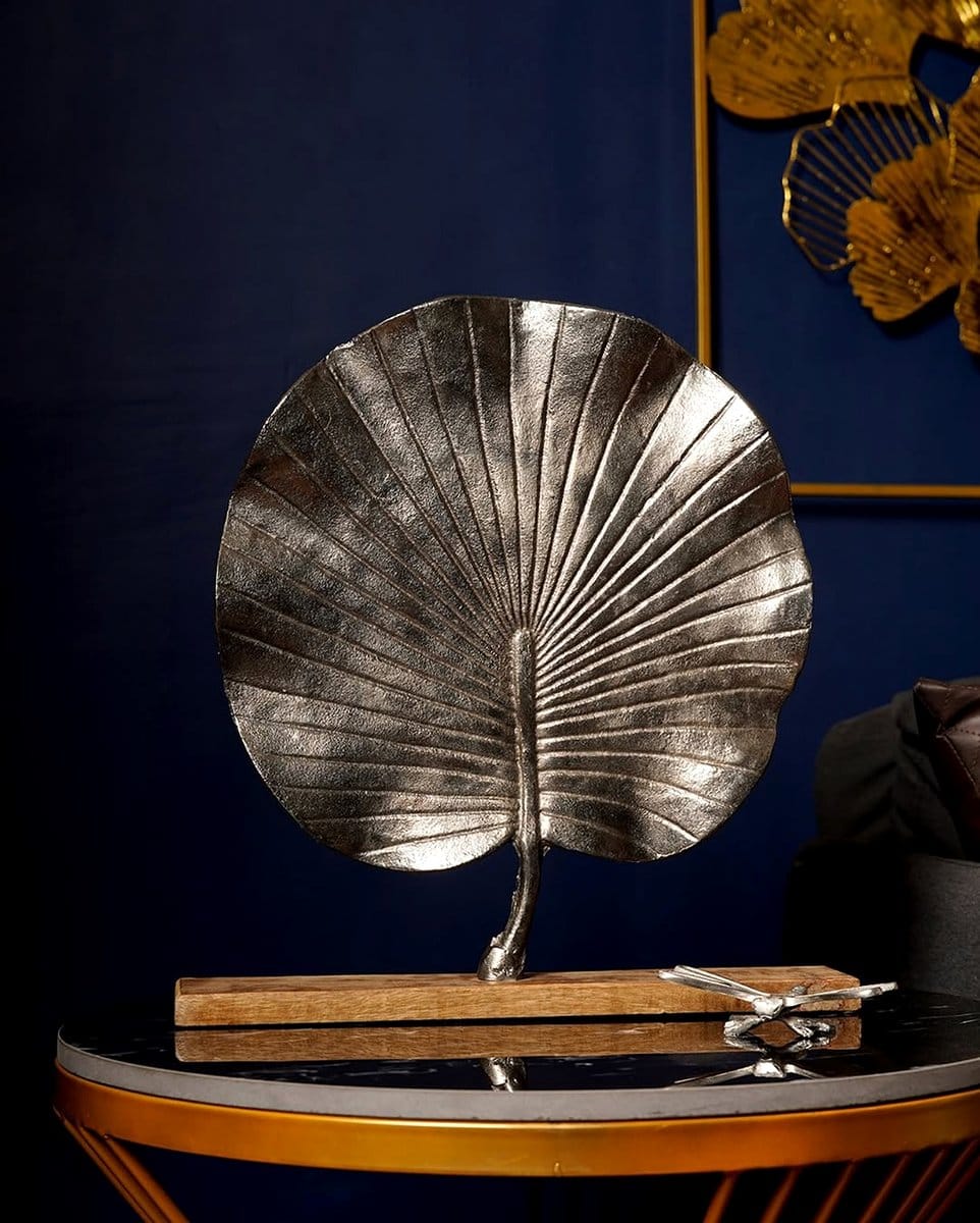 wall sconce with leaf accents