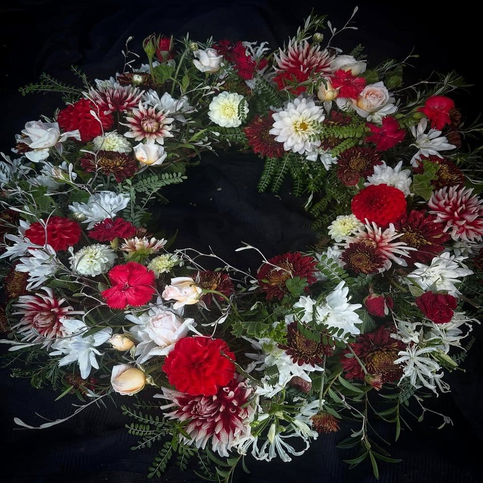 Seasonal wildflower wreath with alpine blooms