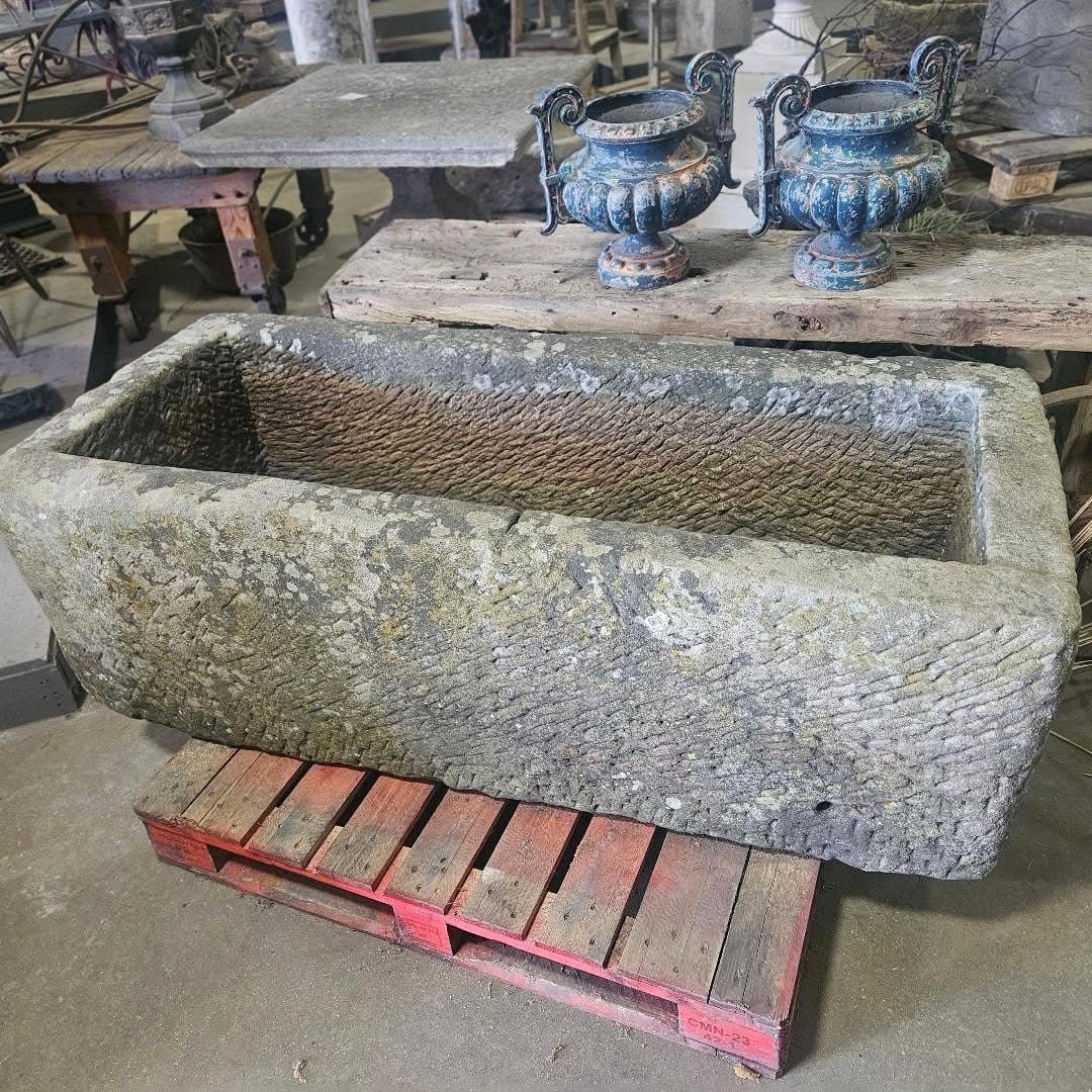 stone sink with sculpted succulents