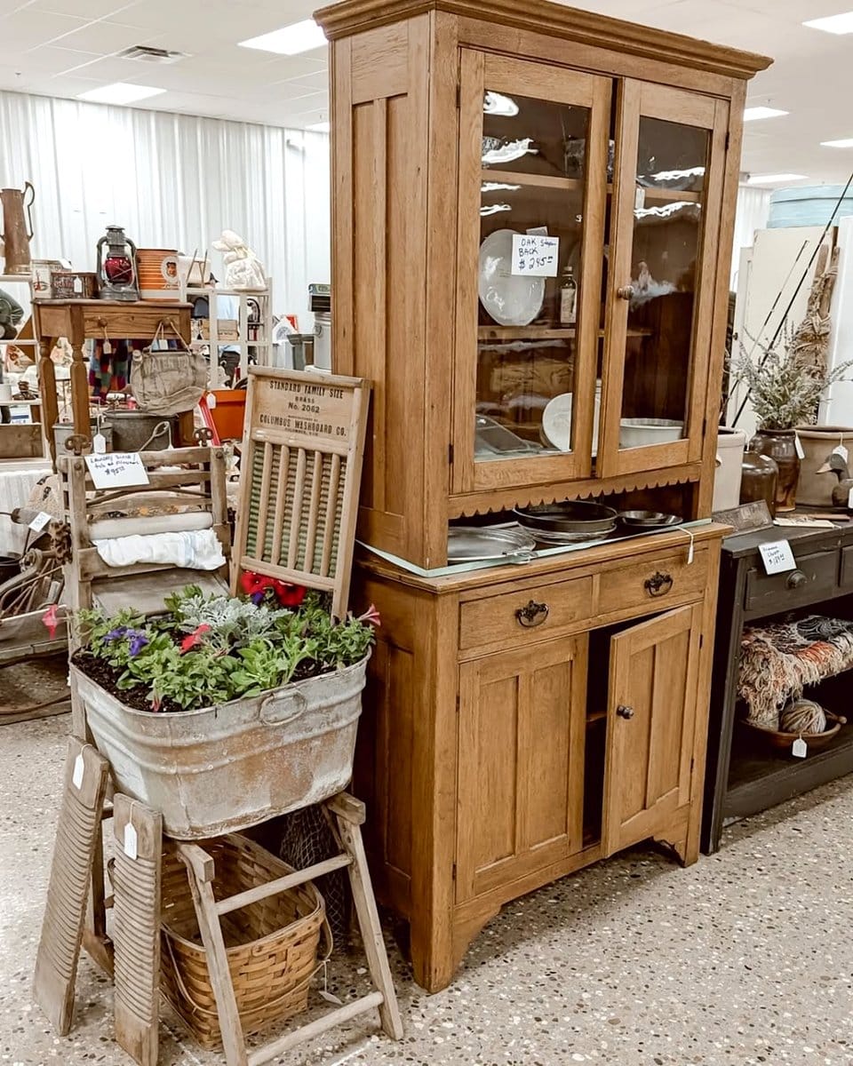 hutch with potted herbs