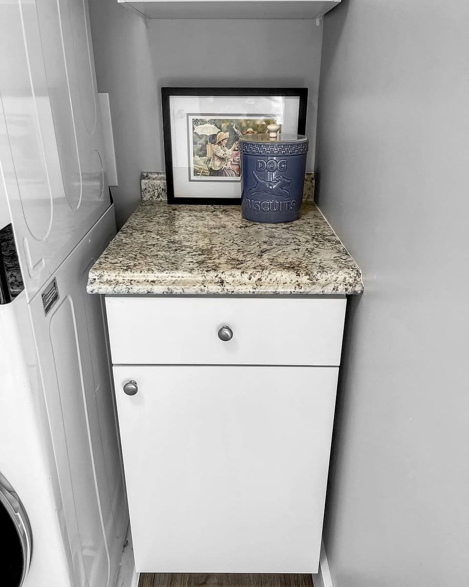 Efficient compact laundry room with stacked appliances