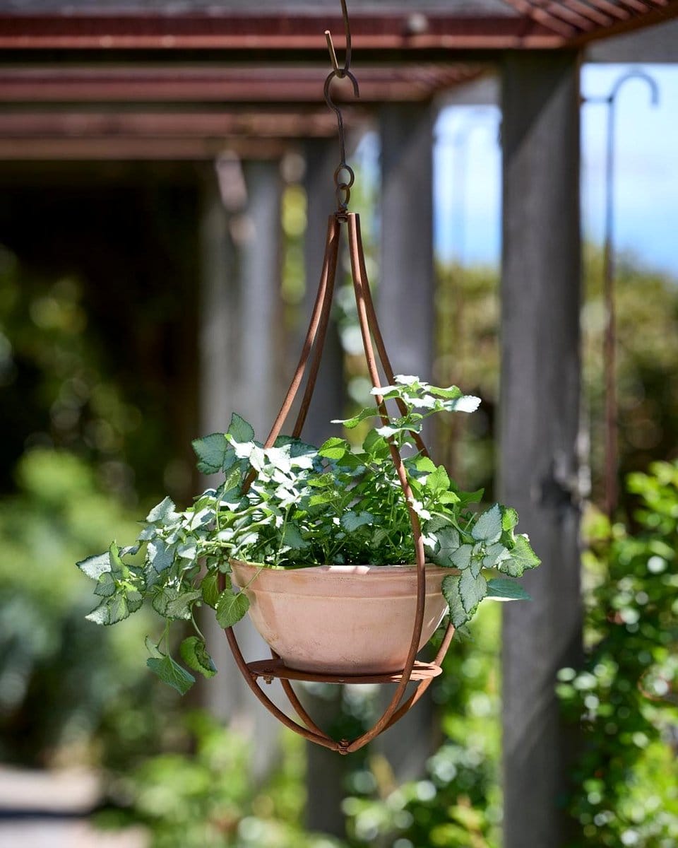 Elegant hanging geode planter with trailing ivy