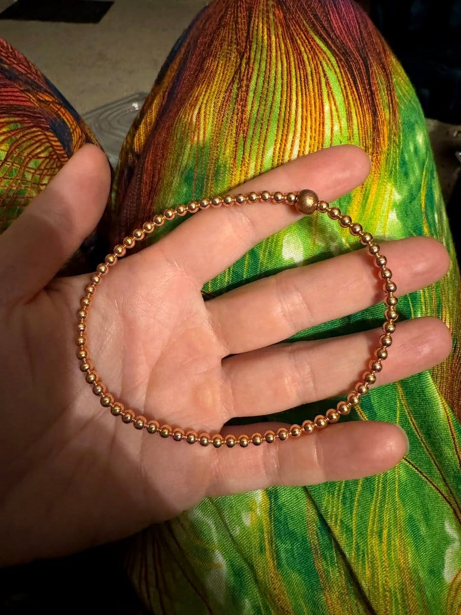 herb-infused anklet on ankle
