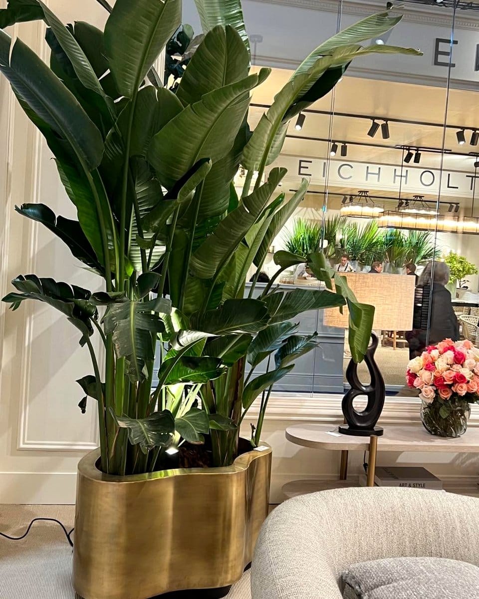 glamorous living room with brass planter