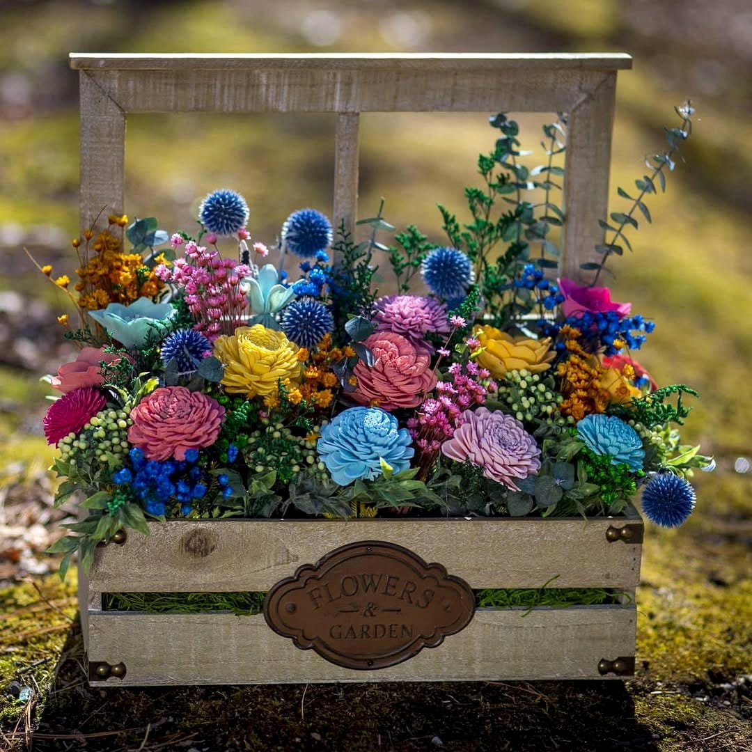 vibrant flowers in decorative crate
