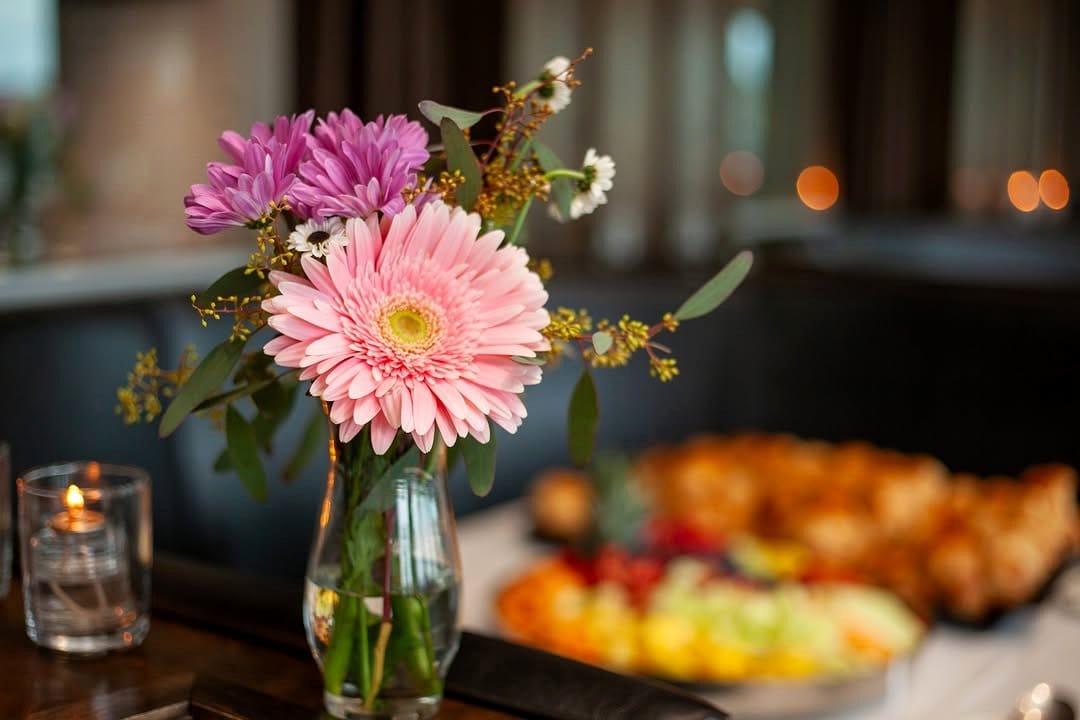 gerbera daisy on kitchen table