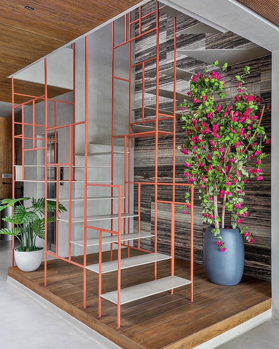 geometric ladder with sculptural plants