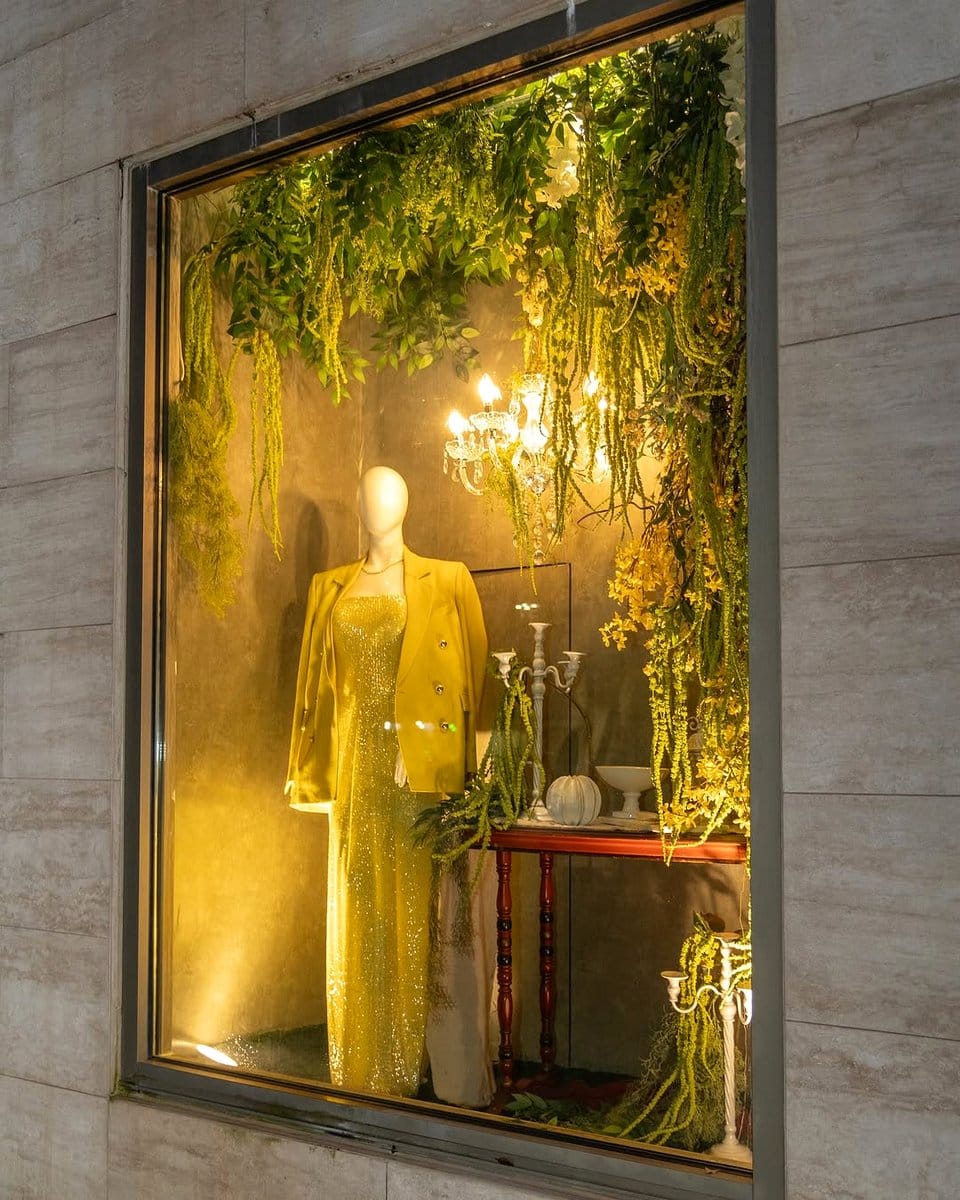 store window with moss display