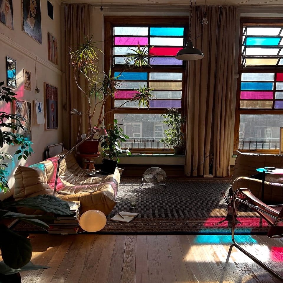 Stained glass room divider with plant patterns