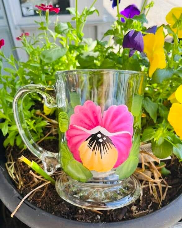 Chamomile flowers in a vintage teacup