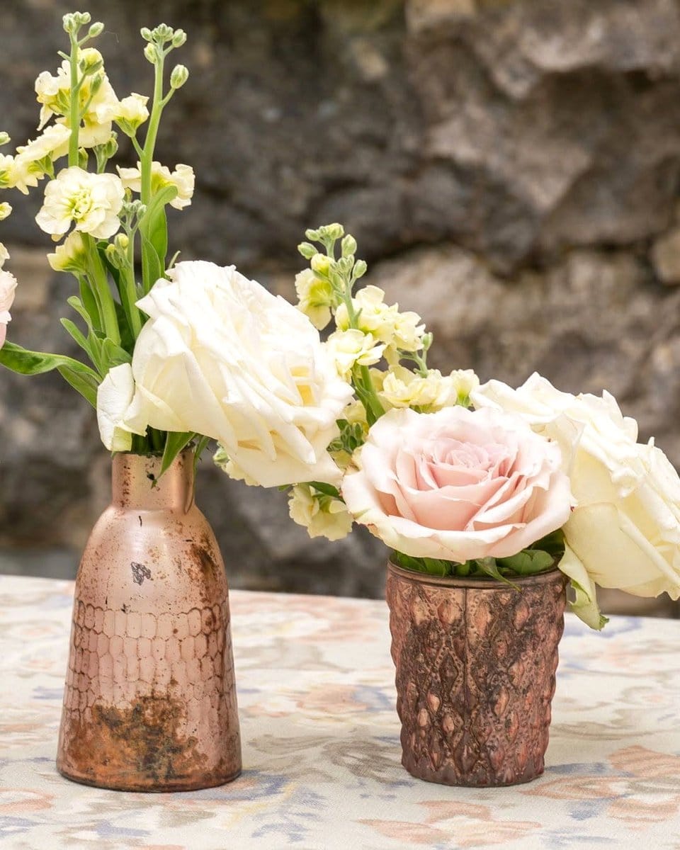 metallic vase on table