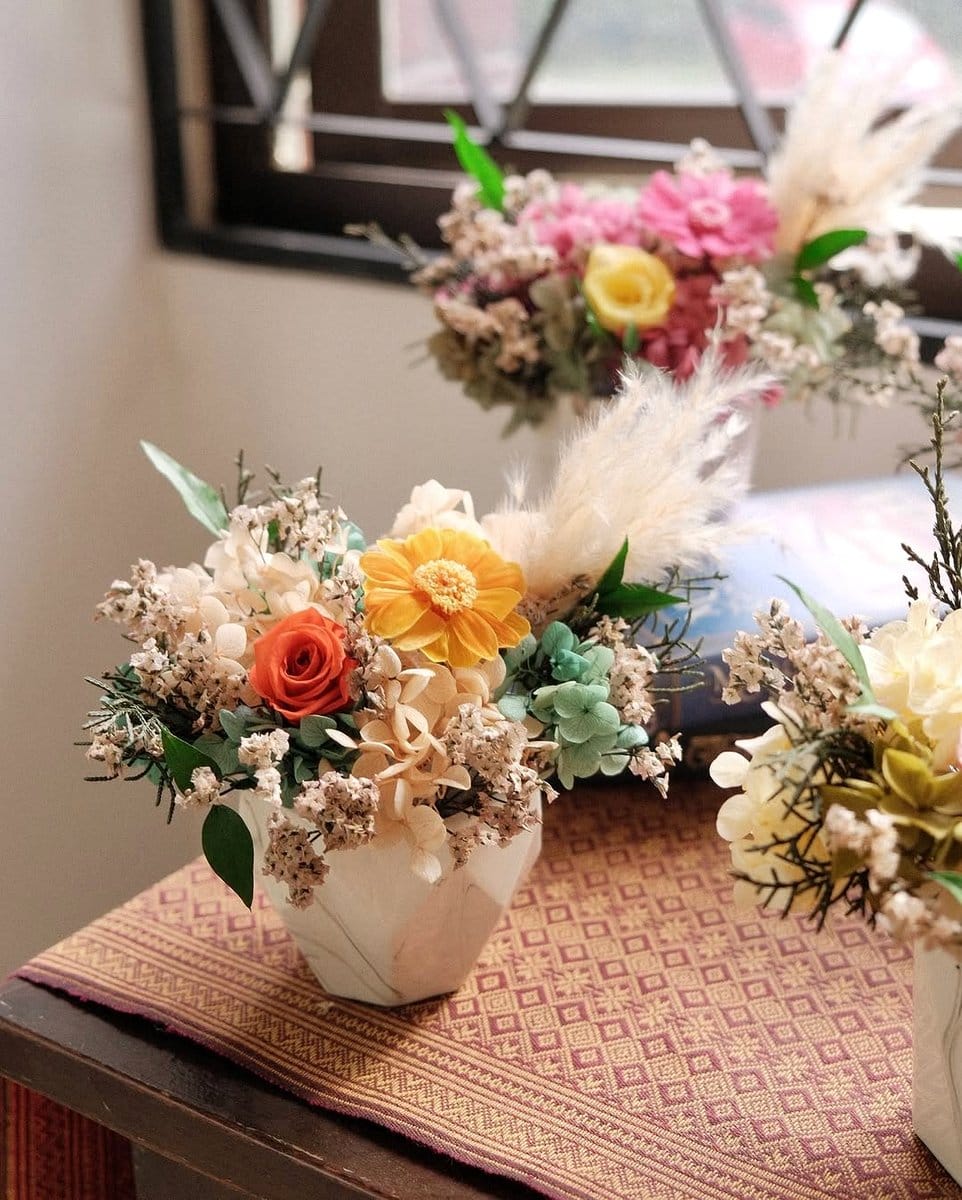 preserved plant arrangement on a shelf