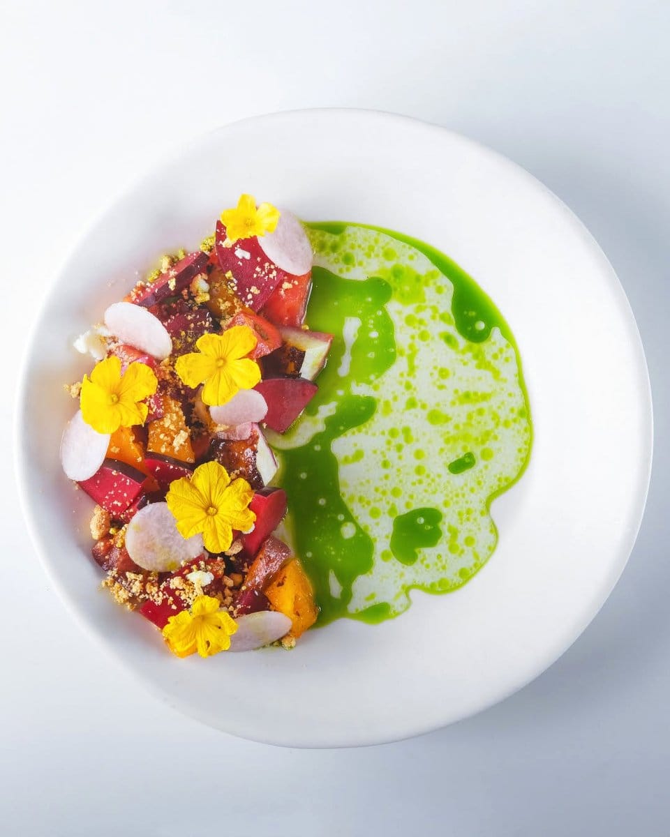 bright flowers around dish