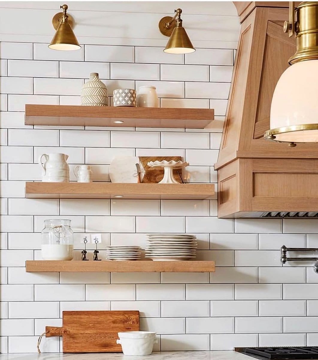 Open wooden kitchen shelves with ceramics
