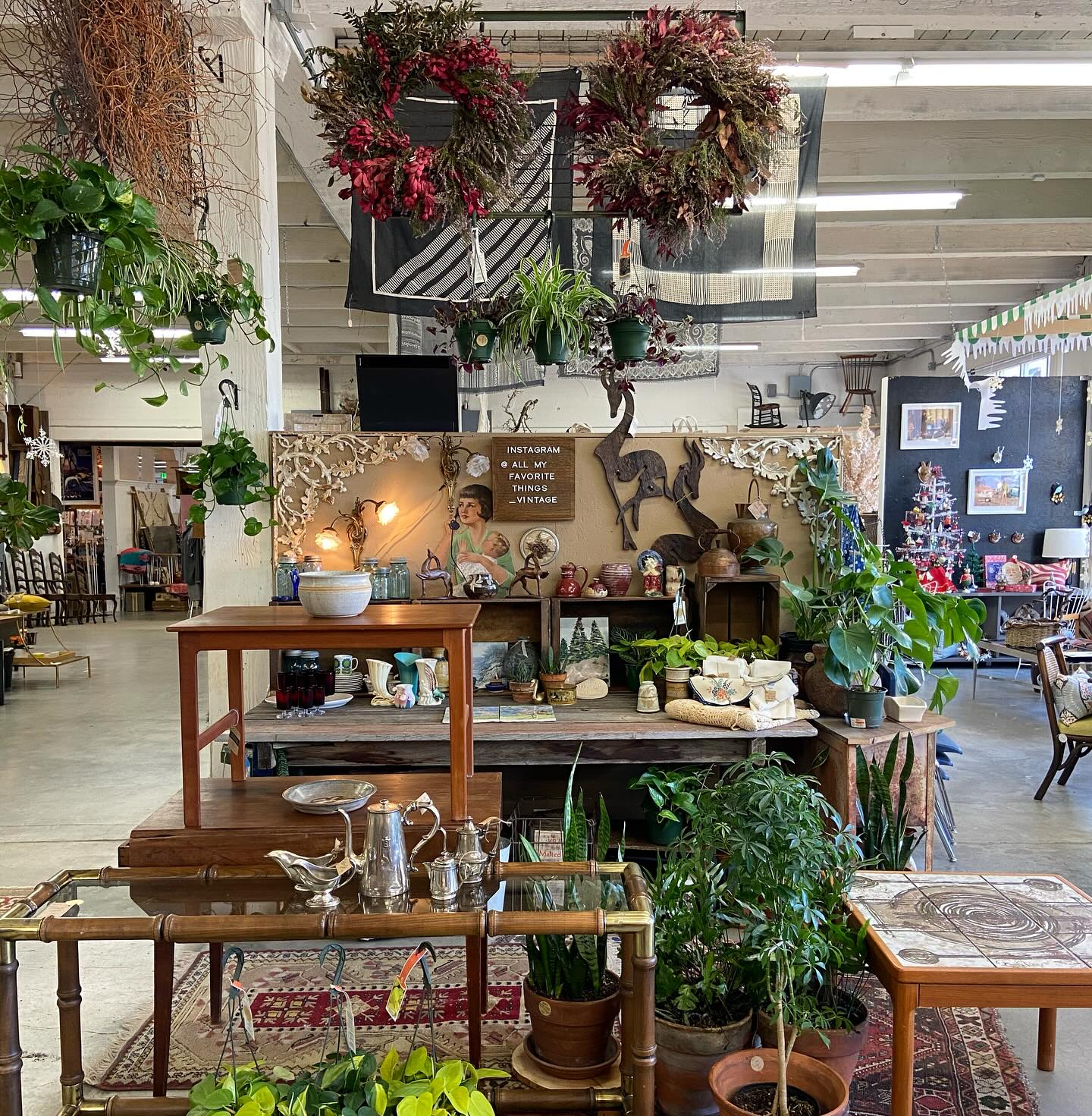 vintage plant stand with potted fern