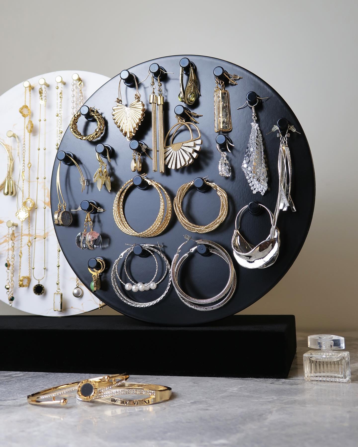 jewelry hanging from vintage radio