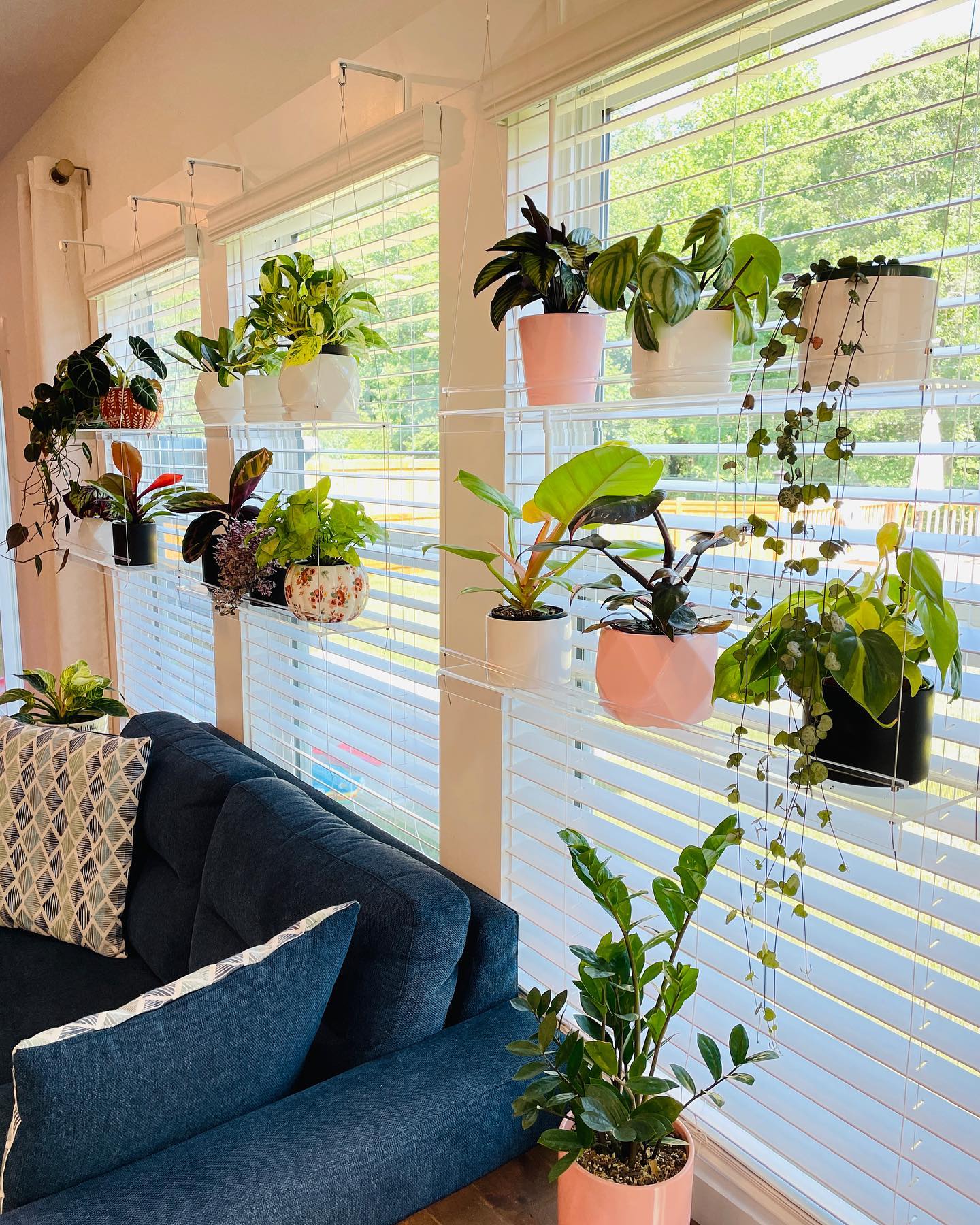 window sill with reclaimed wood plant mounts