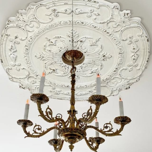 abstract metal chandelier with hanging orchids