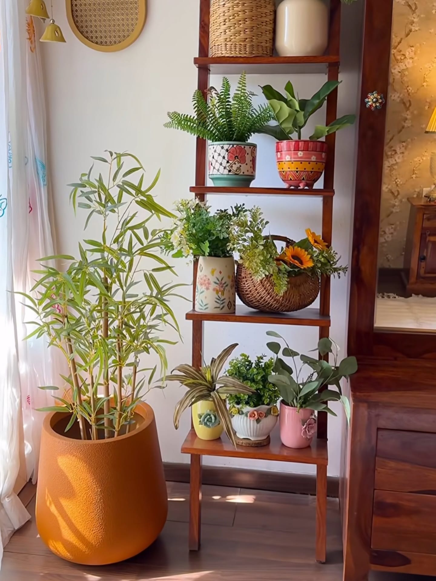 minimalist bamboo plant shelf with succulents