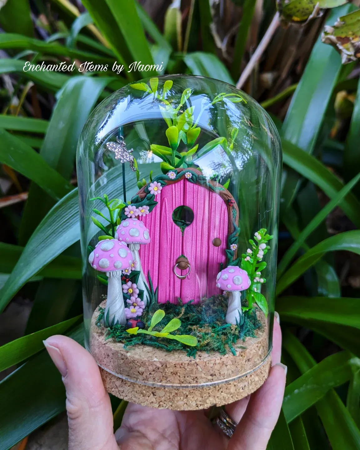 miniature fairy garden in birdcage
